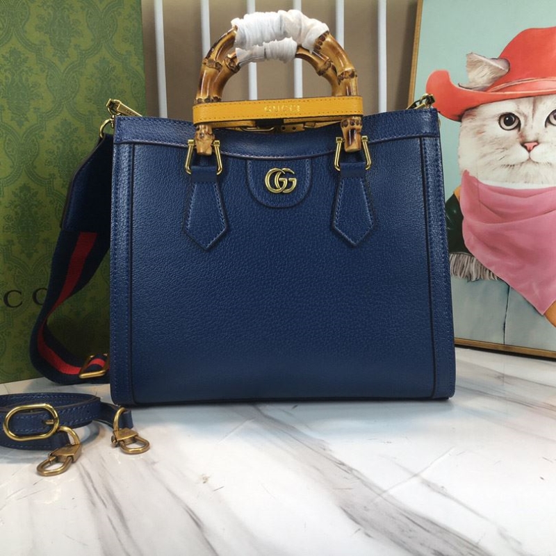 G*u*i top handle bags